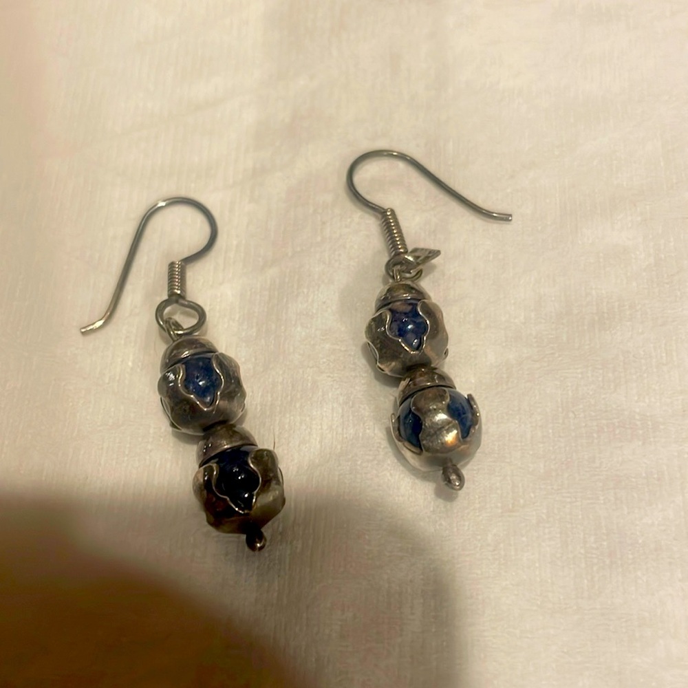 Vintage Silver earrings with blue stones. One has tag